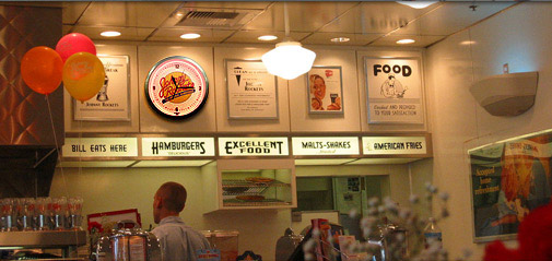 Restaurant with Neon Clocks