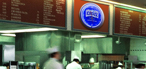 Busy Restaurant with Neon Clock above the counter