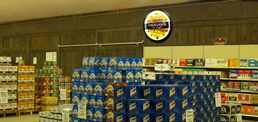 Beer Displays with Neon Clocks in the background